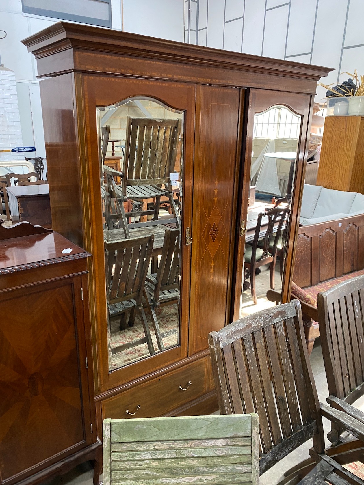 An Edwardian inlaid mahogany mirrored wardrobe, width 158cm, depth 52cm, height 208cm